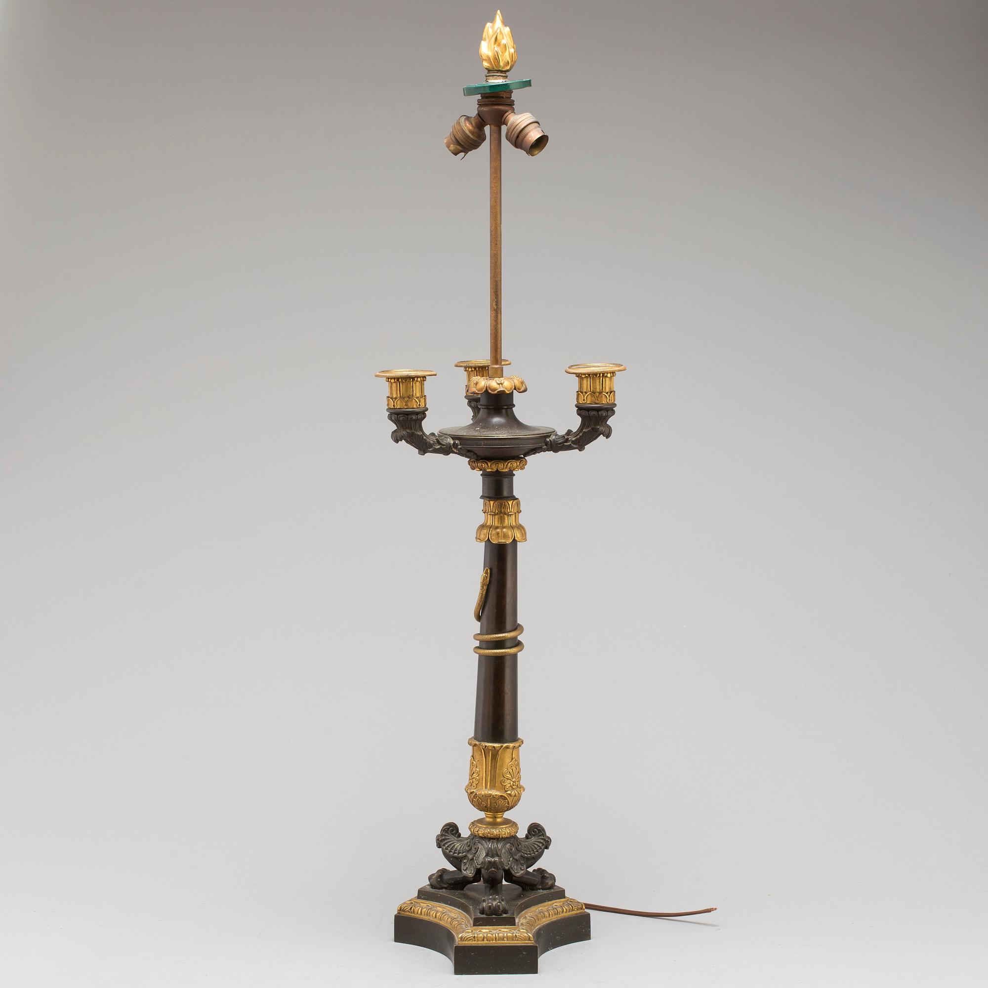 A first half of the 19th century bronze table lamp.