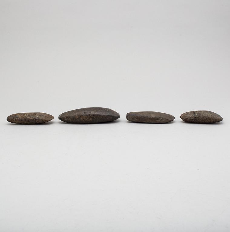 Four neolithic stone axes.