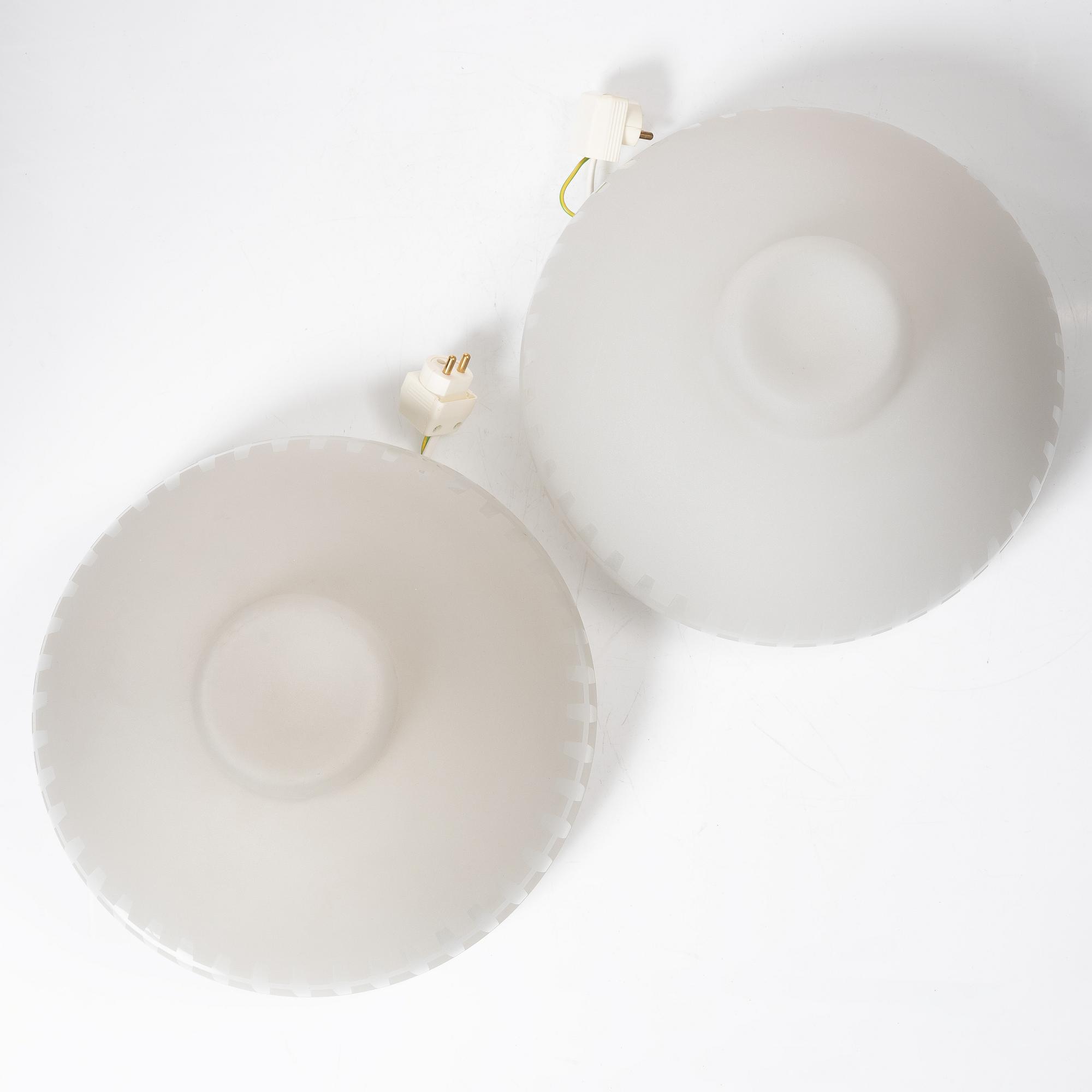 Harald Notini, or Uno Westerberg, a pair of ceiling lamps model "12012", Arvid Böhlmarks Lampfabrik, Stockholm, 1950s.