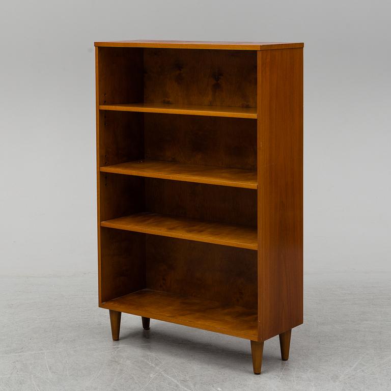 A 1940s walnut veneered shelf.