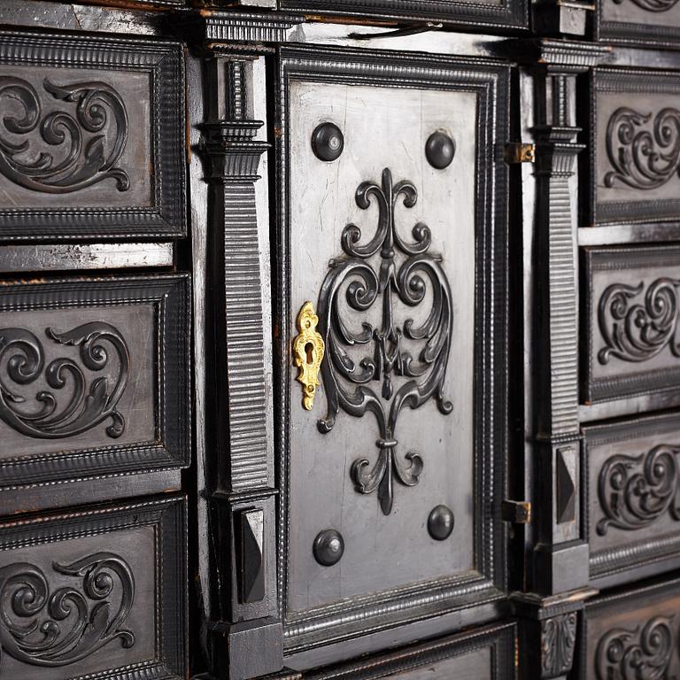 A South-German Baroque ebonized collector's cabinet on stand, circa 1700.