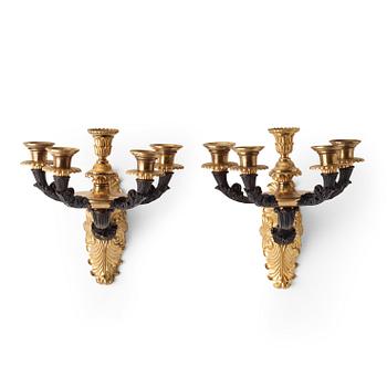 A pair of French circa 1830 five-light wall-lights.