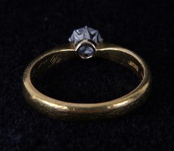 RING, 23K guld med briljant ca 0,25ct.