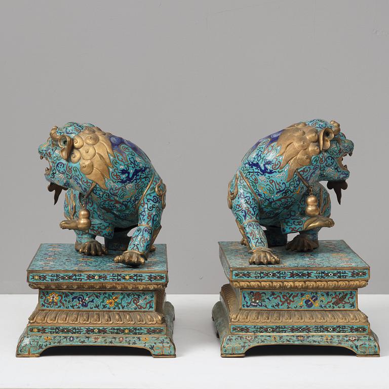 A large pair of cloisonné temple lions, Qing dynasty, 19th Century.