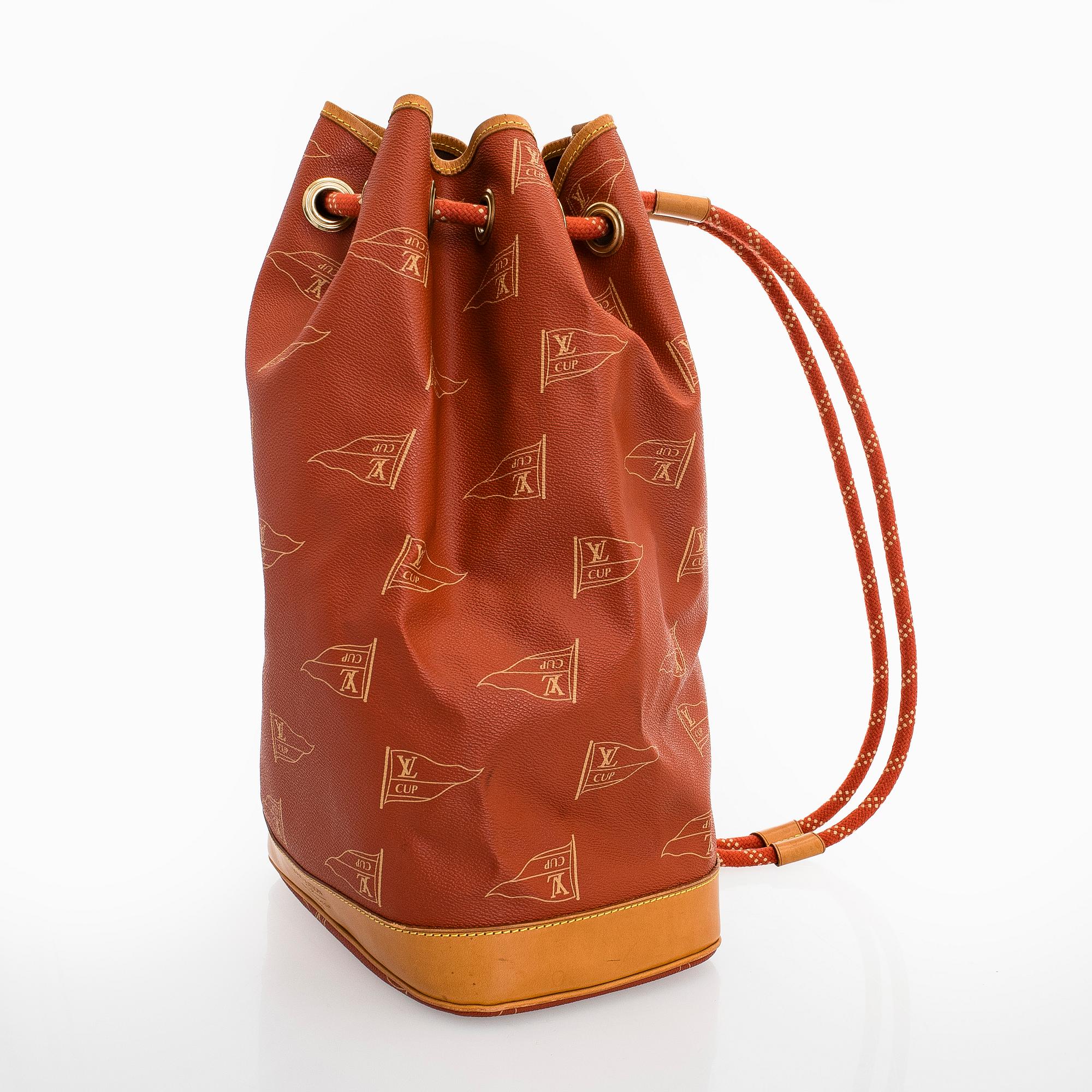 Louis Vuitton, a '1995 LV Cup St. Tropez Drawstring Backpack' bag.