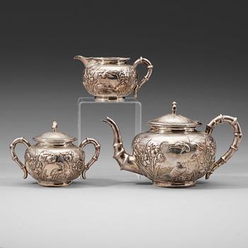 298. A three piece export silver tea service, Shanghai, early 20th Century.