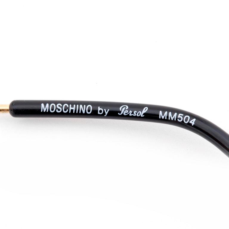 MOSCHINO, a pair of sunglasses.