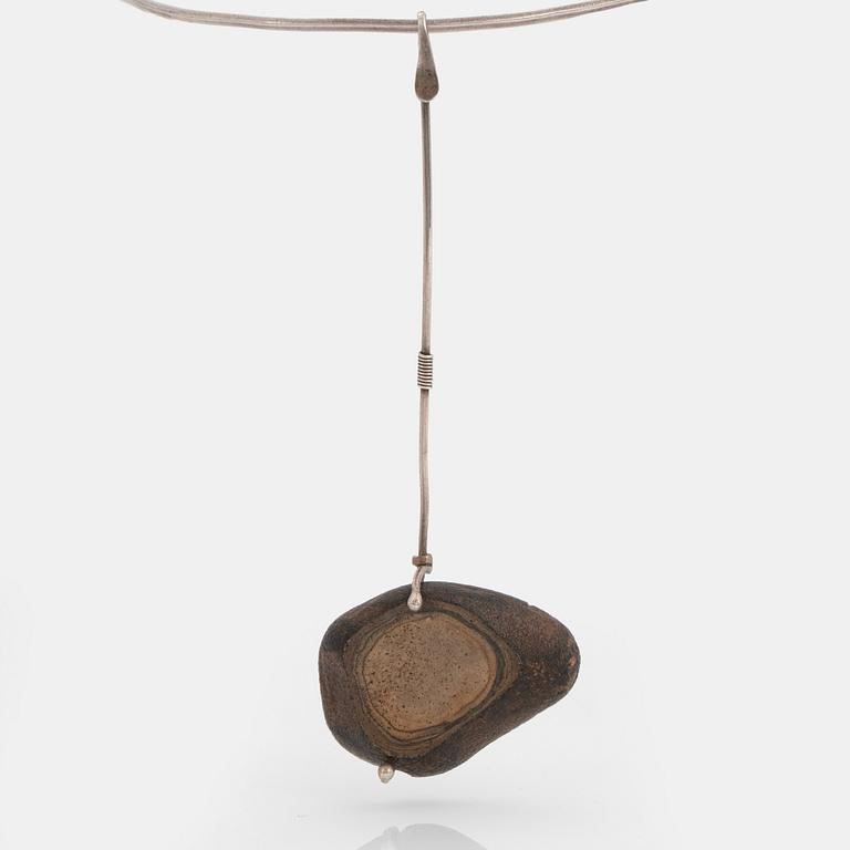 Vivianna Torun Bülow-Hübe, a silver necklace with a beach stone pendant, executed in her own workshop in France, ca 1958-64.