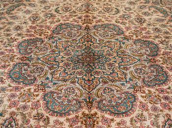 A CARPET, an old silk Turkey, ca 428 x 299-307 cm.