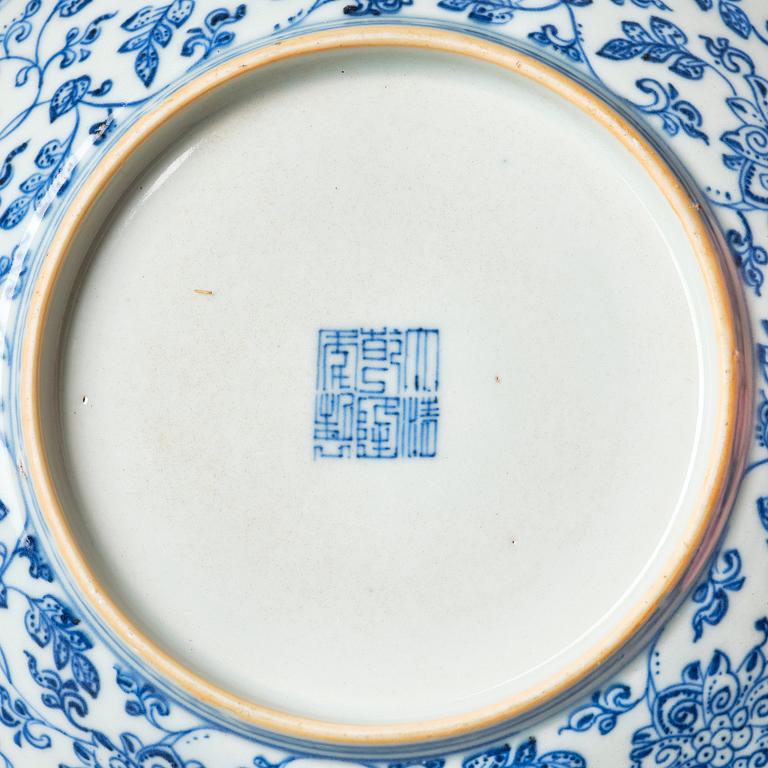 A pair of blue and white lotus dishes, Qing dynasty, Qianlong seal mark and of the period (1736-95).