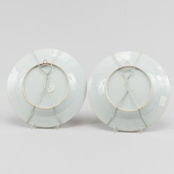 A famille rose dish and two dinner plates, Qing dynasty, Qianlong (1736-95).