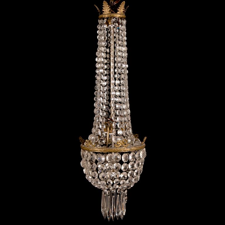 An early 20th century cut glass chandelier.