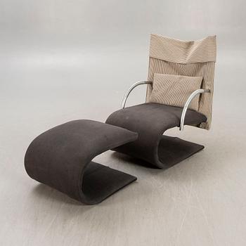 A Claude Brisson armchair and stool for Ligne Roset laer part of the 20th century.