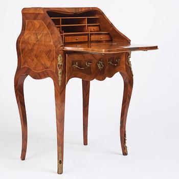 A rococo parquetry secretaire, Stockholm, later part of the 18th century.