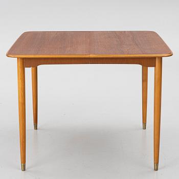 A dining table, teak, 1960s.