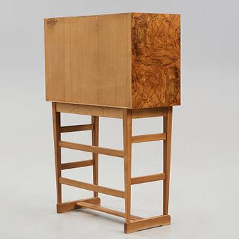 A Josef Frank cabinet on stand, model nr 2237, Svenskt Tenn, Sweden 1965, signed to the back.