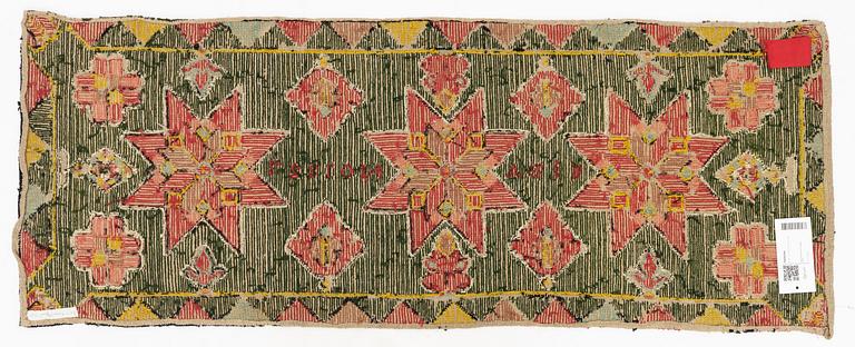 A flat weave carrige cushion, Scania dated 1827.