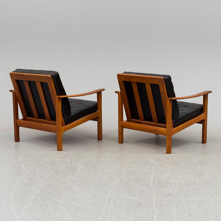 a pair of 1960's armchairs.