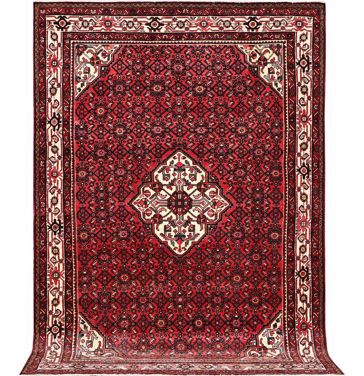 A Hosseinabad carpet, c. 310 x 210 cm.