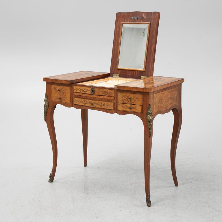 A Louis XV style dressing table, early 20th Century.