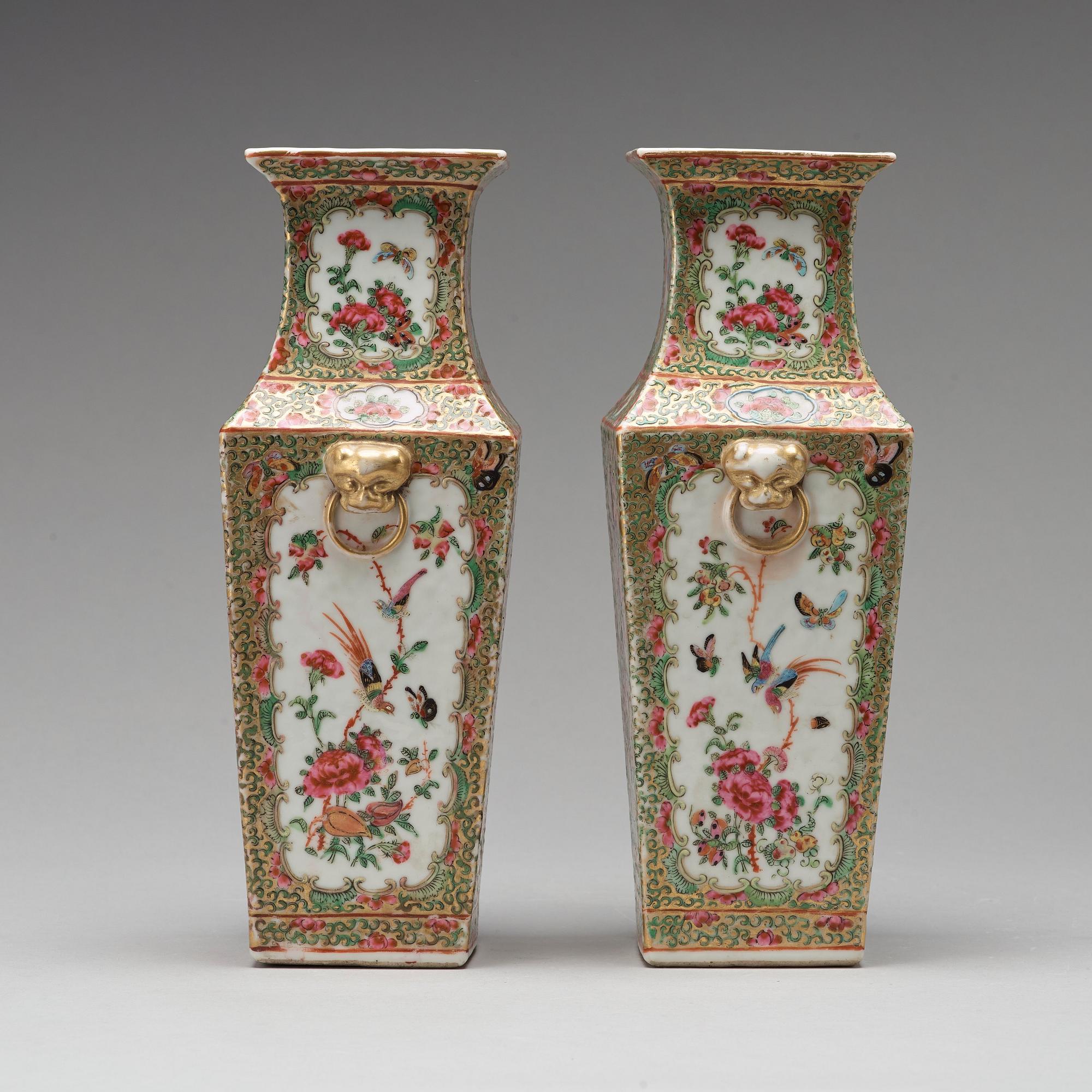 A pair of Canton famille rose vases, Qing dynasty, 19th Century.
