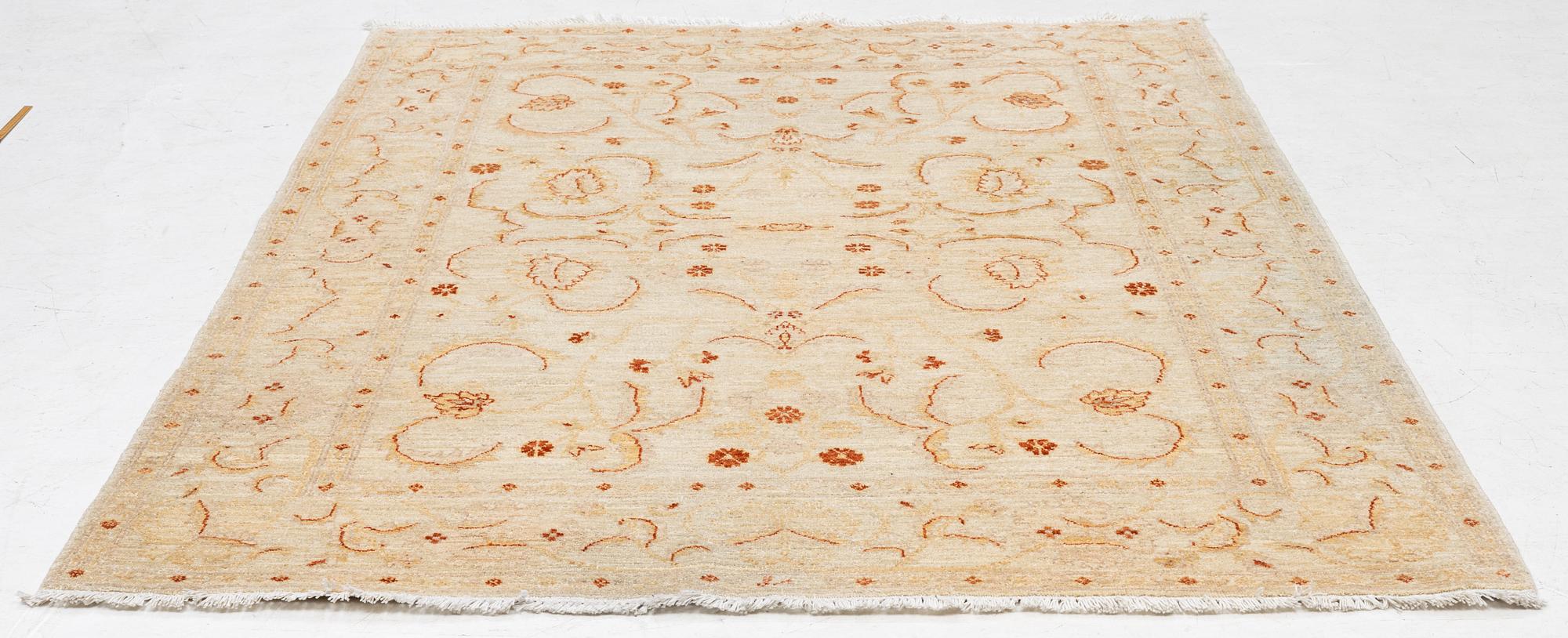 A Ziegler Design rug, c. 225 x 165 cm.