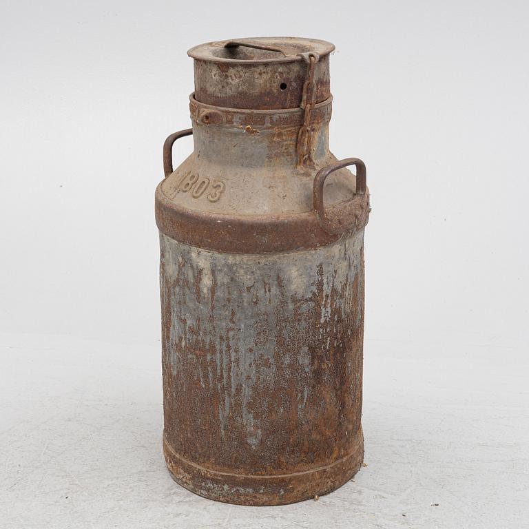 A milk pail, numbered 1803.