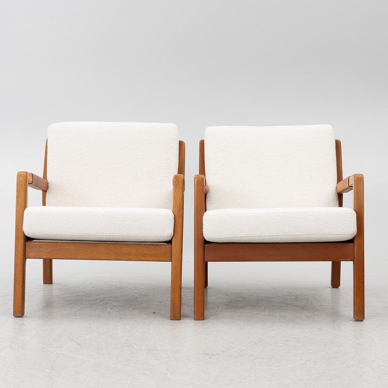 Carl Gustaf Hiort af Ornäs, a matched pair of 'Rialto' lounge chairs, Puunveisto Oy - Träsnideri Ab, Finland, mid-20th century.
