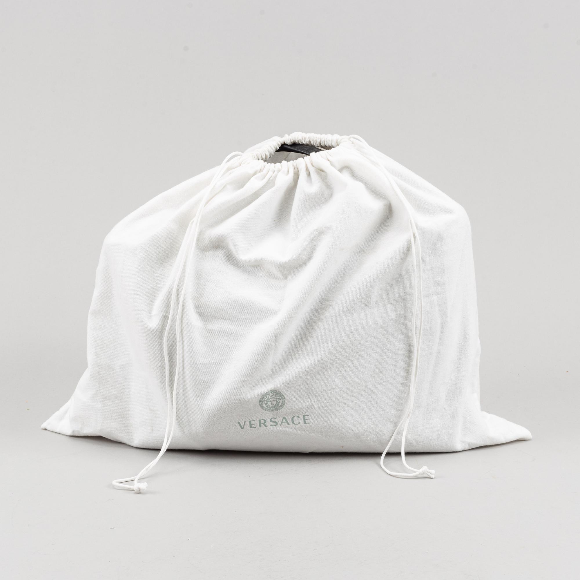 Versace, a black quilted leather handbag.