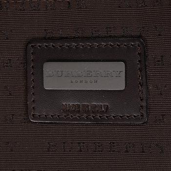 Burberry, a Nova Check canvas suitcase.