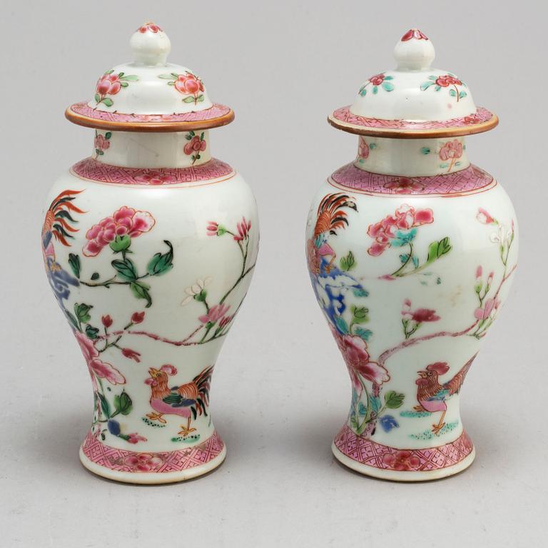 A set of three famille rose plates and two minature vases with covers, Qing dynasyt, Qianlong (1736-95).