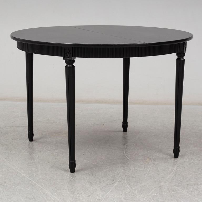 A late 20th Century painted table.