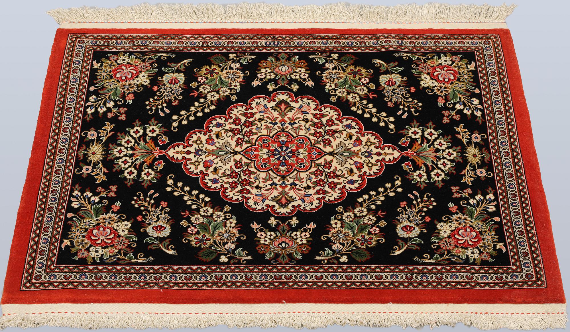 A pair of Tabriz rugs, part silk, so-called 50 Raj, 92 x 62 cm.