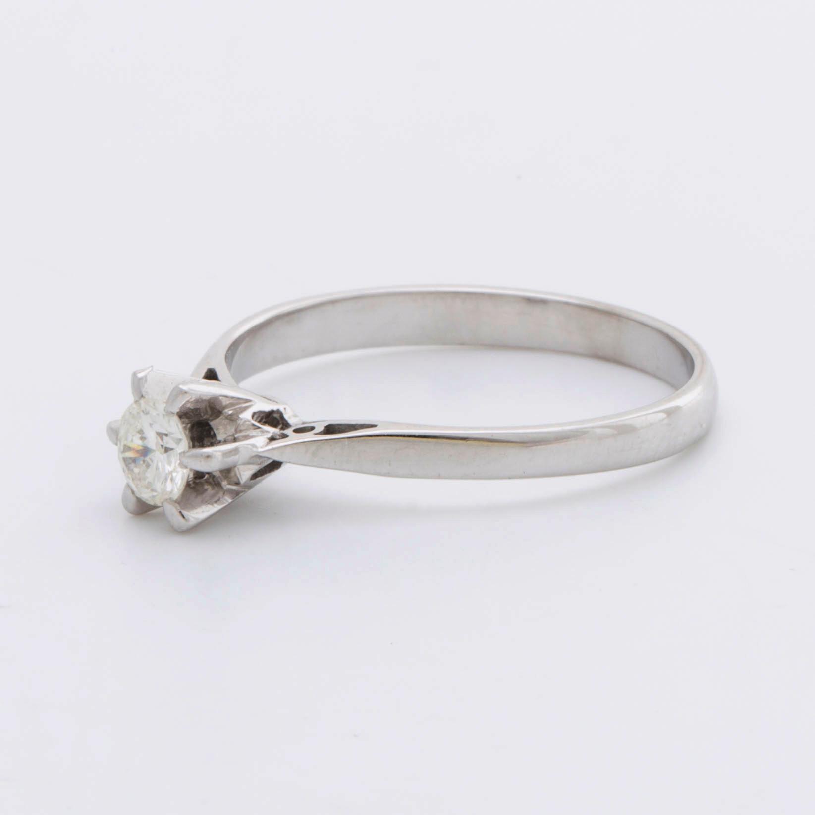 RING 18K vitguld m 1 briljant ca 0,25 ct.