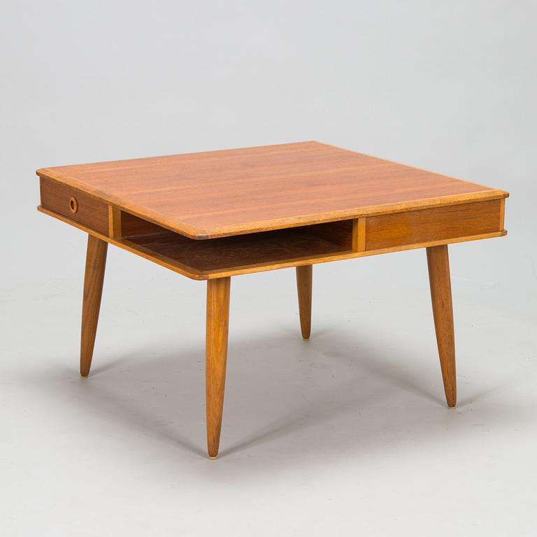 A 1950s/60s coffee table with drawers.