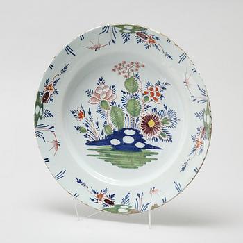 A faience dish, 18th century.