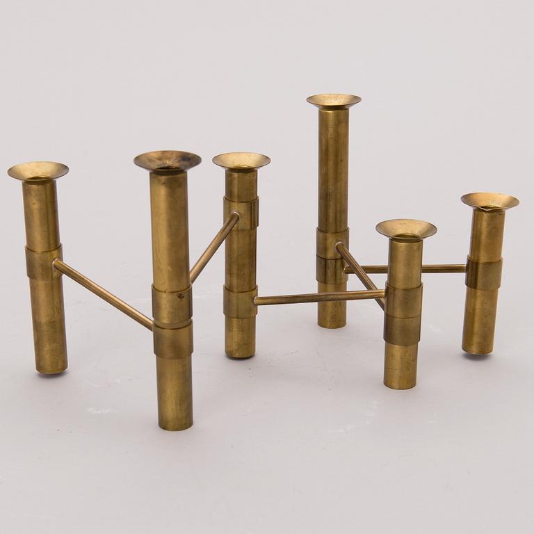 A 1970s 'Nonstop' brass serial candelabra by Hopeakeskus, Finland.