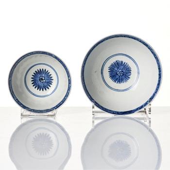 A blue and white soft paste 'three abundances' bowl with cover and a bowl, Qing dynasty, 18th century.