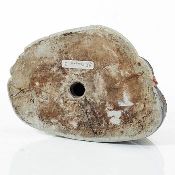 A Chinese famille rose porcelain figure of a Budai, around 1900.