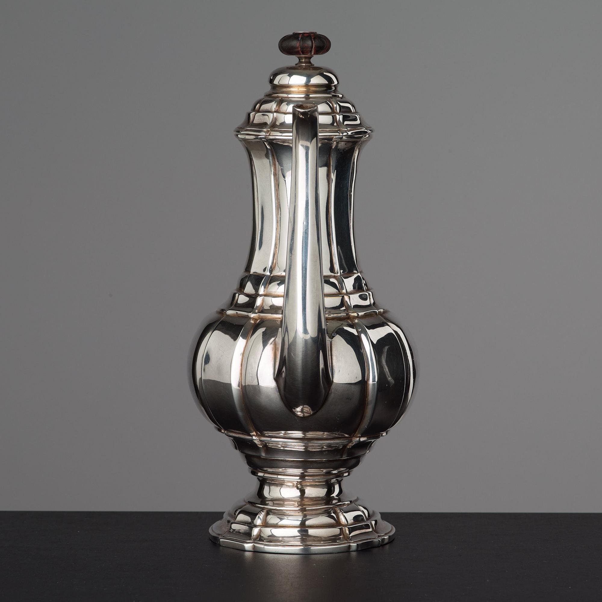 A Rococo mid 18th century coffee pot.