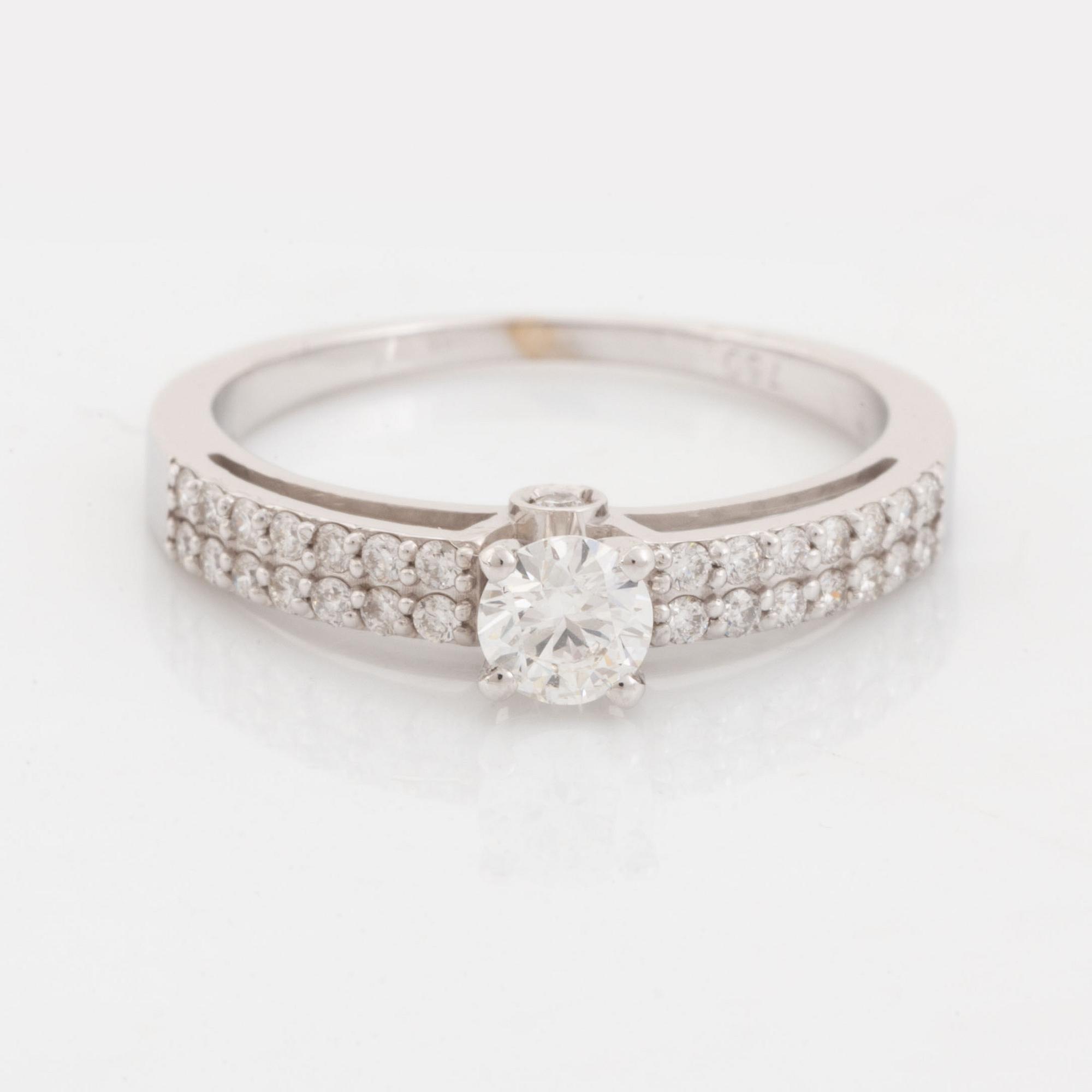 Brilliant cut diamond ring.