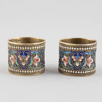 A Pair of Silver and Enamel Napkin Rings and Spoon, Russia 1896-1926.