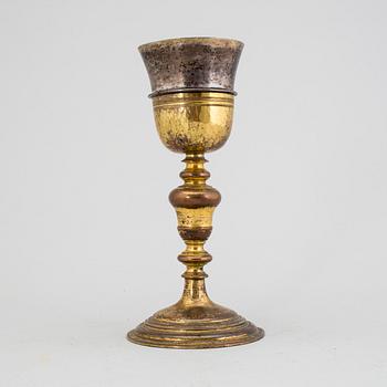 A brass chalice 18th century.