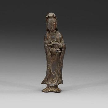 A bronze standing Guanyin holding a ruyi-scepter, Qing dynasty, 18th century.