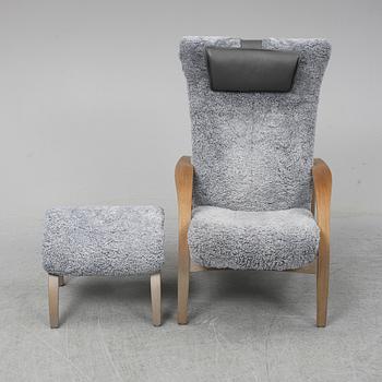 A 'Delta Adventure' easy chair with foot rest, Brunstad, Norge.