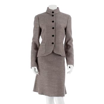 413. EMPORIO ARMANI, a two-piece suit consisting of a jacket and skirt, size 46 and 44.