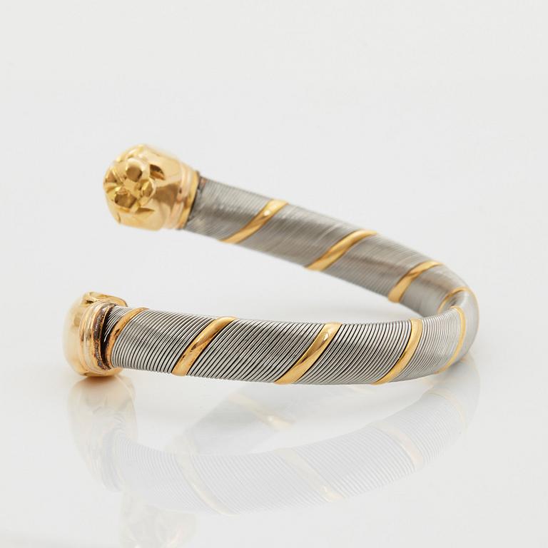 A Cartier "Panthère" bracelet in steel and 18K gold.