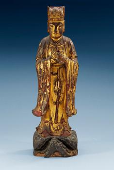 A lacquered and gilded wooden figure of a Buddhist deity, Qing dynasty, 17/18th Century.