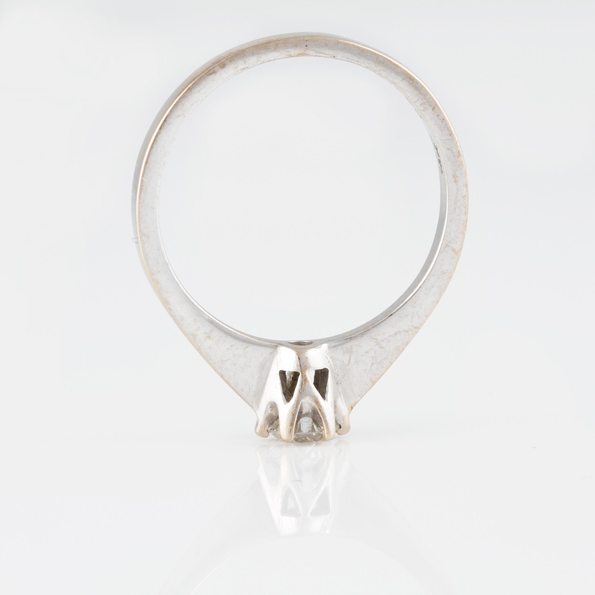 RING, 18K guld med briljantslipad diamant 0.25 ct, Iduna, Varberg. Vikt 2,5 gram.