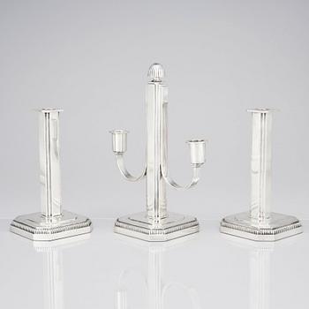 W.A. Bolin, a pair of silver candlesticks and a candelabrum, Stockholm 1953.